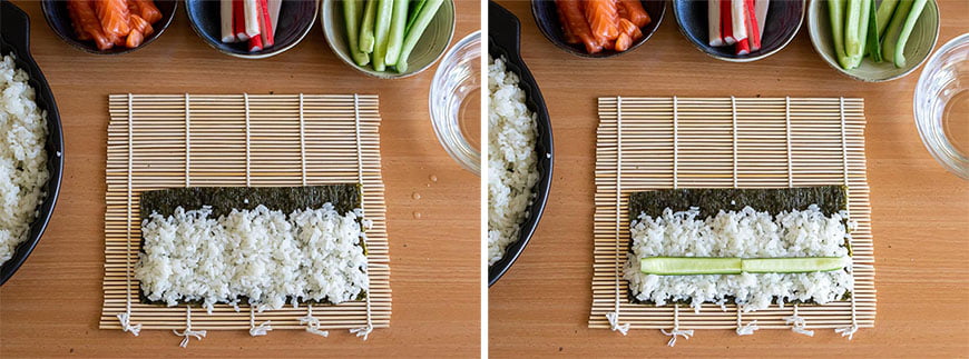 Rijst en komkommer op nori leggen voor Hosomaki Sushi